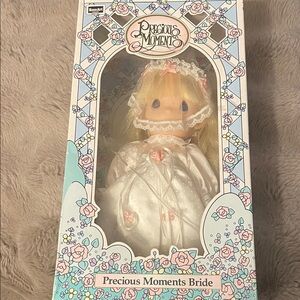 Precious Moments Bride Doll in White Satin Gown with Pink Accents